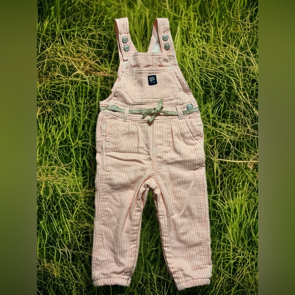 Pink and white striped jean overalls with gold giltter belt. Baby B’gosh